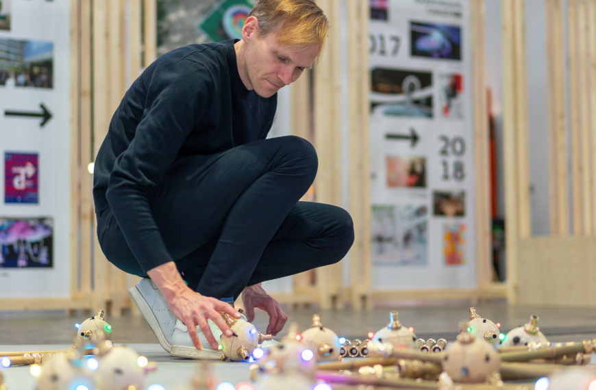 Photo of Felix with bamboo and lights